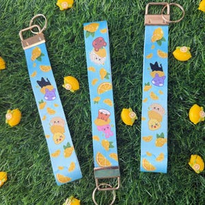 Pochette da polso a tema Lemon Drop di Ateez Aniteez