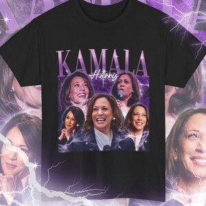 May include: Black t-shirt with a purple graphic of Kamala Harris. The graphic features multiple images of Harris in different poses, with the text "Kamala Harris" in a purple font.