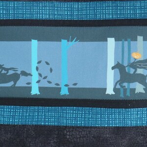 May include: A fabric panel featuring a Halloween-themed design. The artwork depicts a headless horseman riding a horse through a forest. The color palette includes shades of blue, teal, and black, creating a spooky atmosphere. The design is bordered by textured stripes.