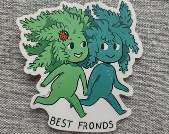 May include: A sticker featuring two cartoon characters with leafy green and teal hair, holding hands and walking. One has a ladybug on its head. The text "BEST FRONDS" is at the bottom.