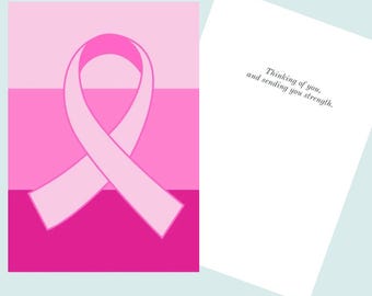 May include: A greeting card featuring a pink ribbon, a symbol of breast cancer awareness, set against a pink gradient background. The open card on the right has the text: "Thinking of you, and sending you strength."