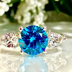 Brilliant Blue Simulated Diamond CZ (8mm 2 cts)/Pear White Sapphire 6x4 (1/2 ct. each) Three Stone Ring, Promise Ring, Christmas Gift,