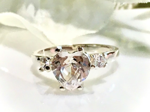 Lab created white sapphire and diamond accent promise ring in sterling silver store