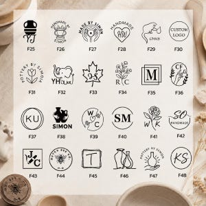 May include: A collection of twenty-four black ink stamp designs arranged in a grid on a light background. Each design features unique line art, including pottery, floral motifs, animals, and initials, labeled with codes from F25 to F48.