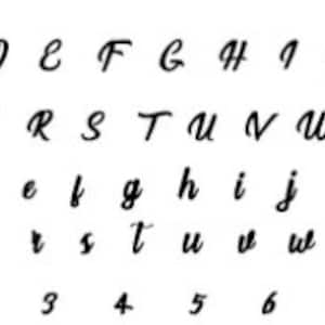 May include: A black script font alphabet display featuring uppercase letters A through Z, lowercase letters a through z, and numerals 0 through 9. Each character is rendered in a consistent, flowing cursive style against a plain white background.