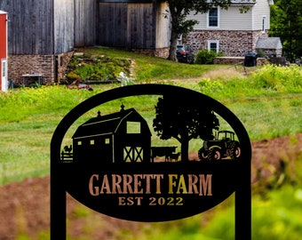 May include: Black metal farm sign featuring a barn, tractor, and cow silhouette. The sign reads "Garrett Farm EST 2022". The background shows a rural farm scene with a barn and house.