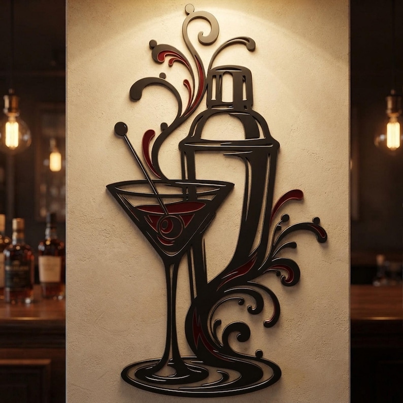May include: A black wall art piece featuring a cocktail shaker and a martini glass with a cherry, accented by swirling decorative lines and deep red highlights. The design is mounted on a flat surface, showcasing a stylized beverage theme.