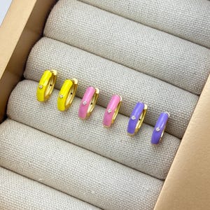 Pastel CZ Huggie Hoop Set by Stella Amoré – Dainty Gold Earrings, 3-Set Pink, Purple & Yellow Enamel Hoops, Chic Pastel Stackable Huggies