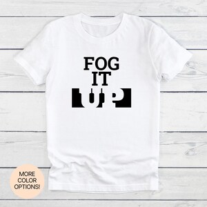 Fog It Up! Unisex Women&#39;s Men&#39;s Tee in Multiple Colors & Sizes. Misty trails, cool vibes, and a bold spirit made for hazy mornings.