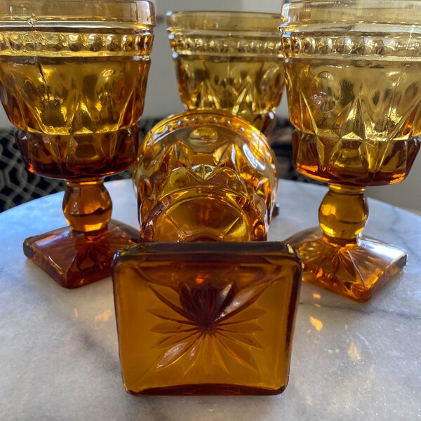 Set of 4 pressed glass amber colony glasses