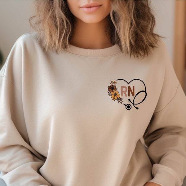 Floral RN Nurse Sweatshirt • Nursing Student Sweater • Flower Print Heart Pocket Top • Nurse Squad Crewneck • Graduation Gift