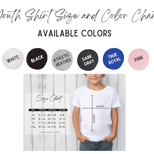 May include: A youth shirt size and color chart with available colors: white, black, athletic heather, dark gray, true royal, and pink. A child models a white t-shirt. The size chart shows measurements in inches for width and length.