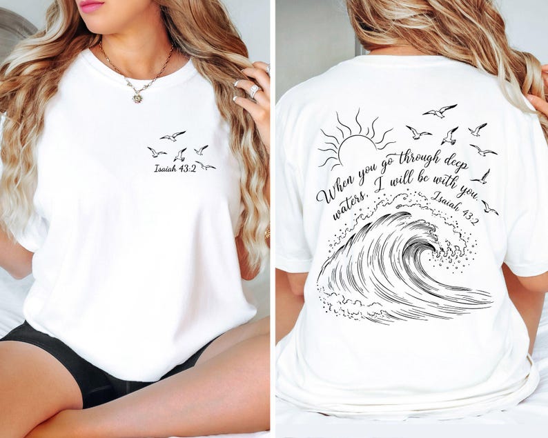 May include: White t-shirt with a small flock of birds and the text "Isaiah 43:2" printed on the front. The back features a wave design, sun, more birds, and the quote "When you go through deep waters. I will be with you. Isaiah 43:2."