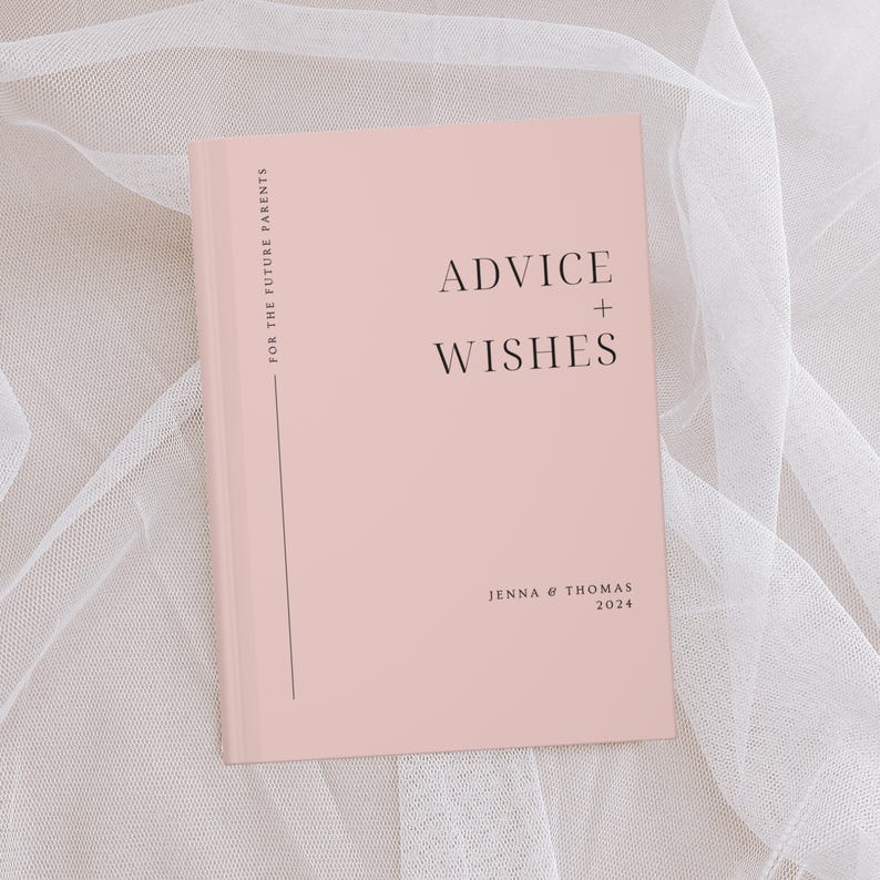 May include: A pink book with the text "Advice + Wishes" on the front cover. The book is for future parents and is personalised with the names "Jenna & Thomas" and the year "2024".