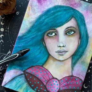 May include: A painting of a woman with long, flowing blue hair and a pink bow with white polka dots. The background is a soft, pastel color.