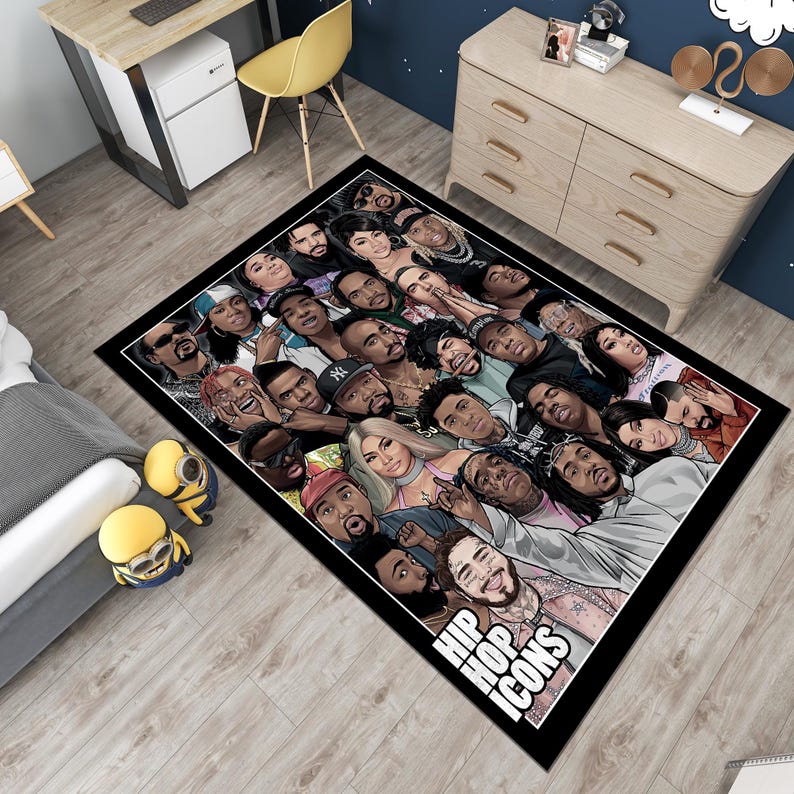May include: Black and white rug with a collage of hip hop icons. The rug features a variety of famous rappers and singers, including 2Pac, Biggie, and Jay-Z. The rug is rectangular and has a black background with white outlines. The text "Hip Hop Icons" is printed in white at the bottom of the rug.