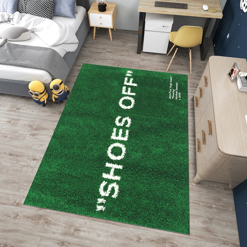 May include: Green area rug with the text "SHOES OFF!" in white lettering.