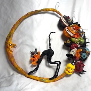 Handsculpted Papermache Primitive Halloween Creepy Vintage Style Moon Wreath with Black Cat Bat Witch Devil Skelly Owl 12” by 13 ” sculpture