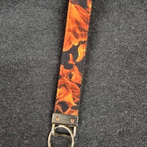 Tema de fuego - Pulsera llavero