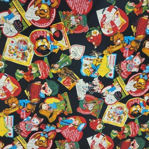May include: A black fabric with a repeating pattern of colorful vintage Valentine's Day cards. The cards feature illustrations of children, animals, and hearts. The text on the cards includes phrases like "My Valentine" and "Love is in the air".