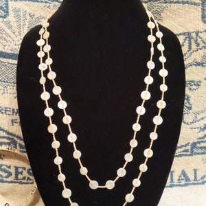 Vintage mother of pearl small buttons crocheted 58 inch rope necklace