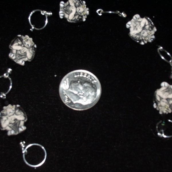 Gargoyle row counter with black and metallic crystals - 6 loops