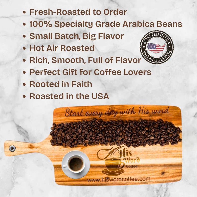Text graphic on a marble background listing eight product bullet points: Fresh-Roasted to Order, 100% Specialty Grade Arabica Beans, Small Batch Big Flavor, Hot Air Roasted, Rich Smooth Full of Flavor, Perfect Gift for Coffee Lovers, Rooted in Faith, Roasted in the USA. Below is a wooden cutting board covered in roasted coffee beans with a small espresso cup and the His Word Coffee logo and website.