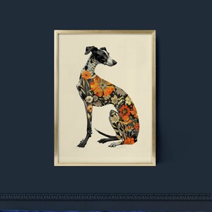 May include: A framed print of a black and white greyhound dog with a floral pattern overlay. The dog is sitting and looking to the right. The background is a light beige color.