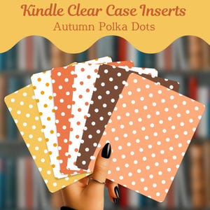 May include: A set of rectangular Kindle clear case inserts featuring an autumn-themed polka dot pattern. The inserts display various color combinations including yellow, orange, white, and brown backgrounds with white or orange dots. Text reads Kindle Clear Case Inserts Autumn Polka Dots.