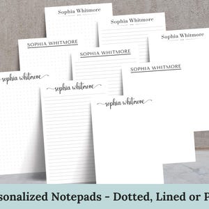 May include: A collection of white notepads with various designs, including dotted, lined, and plain pages. Each notepad features the name "Sophia Whitmore" printed in elegant fonts. The image also includes the text "Personalized Notepads - Dotted, Lined or Plain".