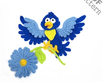 May include: Crochet pattern PDF for a blue bird with yellow accents, perched on a blue flower with green leaves. The pattern is titled "PDF pattern".