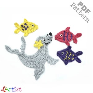 May include: Crochet pattern PDF for a gray seal, a yellow fish, a red fish with stripes, and a purple fish with yellow stripes.  PDF pattern.