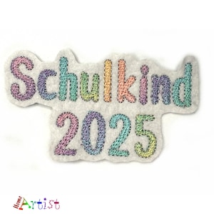 May include: A colorful embroidered patch with the text "Schulkind 2025". The patch is made of felt and has a white background.