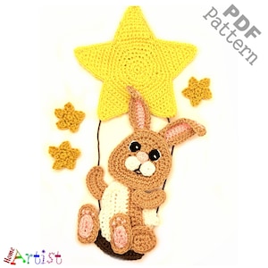 May include: Crochet pattern for a cute bunny holding onto a yellow star. The pattern includes instructions for making the bunny, the star, and three smaller stars.