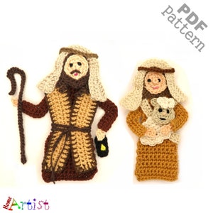 May include: Crochet pattern for a shepherd and a shepherdess with a lamb. The shepherd is wearing a brown robe and a tan scarf. The shepherdess is wearing a tan robe and a white scarf. The lamb is white with brown eyes.