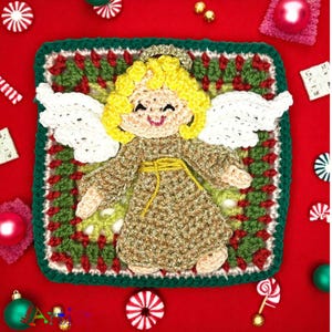 May include: A crocheted Christmas angel with blonde hair, white wings, and a gold halo, on a green, red, and white crocheted square. The angel is surrounded by Christmas decorations on a red background.