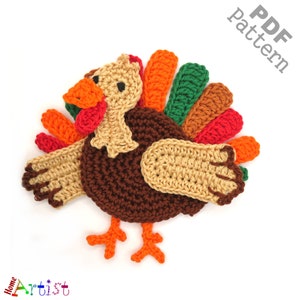May include: Crocheted turkey applique with brown, orange, red, and green feathers. The turkey has a brown body, orange legs, and a red head. The text "PDF pattern" is in the upper right corner of the image.
