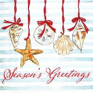 May include: A decorative paper napkin featuring a watercolor illustration of various seashells and a starfish hanging from red ribbons with bows against a light blue and white horizontal striped background, with the text Season's Greetings in red.