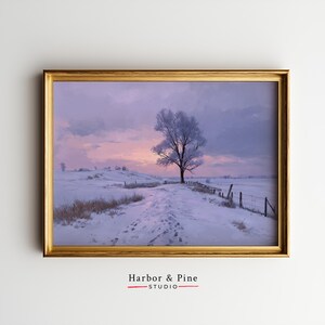 May include: Framed landscape art print featuring a winter scene with a snow-covered path leading to a lone tree. The sky transitions from pink to purple, with a gold-colored frame. The text "Harbor & Pine STUDIO" is at the bottom.