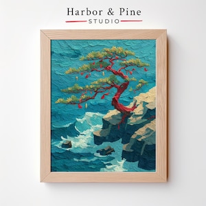 May include: Framed art print of a bonsai tree with red branches and green foliage, set against a turquoise ocean and rocky cliffside. The artwork is in a light wood frame, with the text "Harbor & Pine STUDIO" at the top.