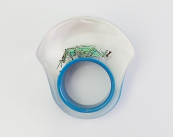 Gorgeous blue lucite ring with real iridescent beetle