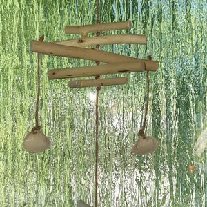 Wind chime made of willow branches and shells