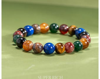 Bracciale con pietre preziose dei 7 chakra / Lapislazzuli, Occhio di tigre e Ossidiana