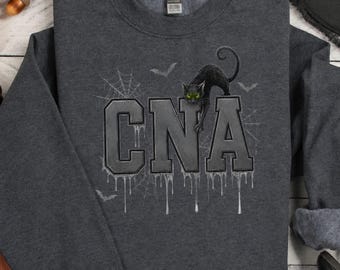 Spooky CNA Halloween Sweatshirt, Comfort Colors Tee or Gildan Sweatshirt, Black Cat Nurse Assistant Gift, Funny CNA Nursing School Grad Tee