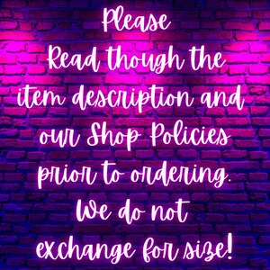 May include: Neon sign on a brick wall that reads: "Please read though the item description and our Shop Policies prior to ordering. We do not exchange for size!"