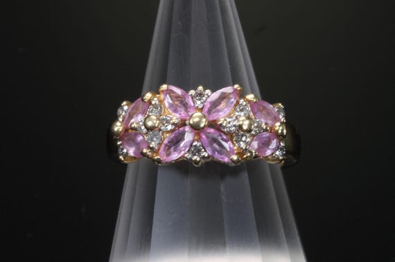 Vintage pink sapphire flowers and diamond 14k yellow gold ring.