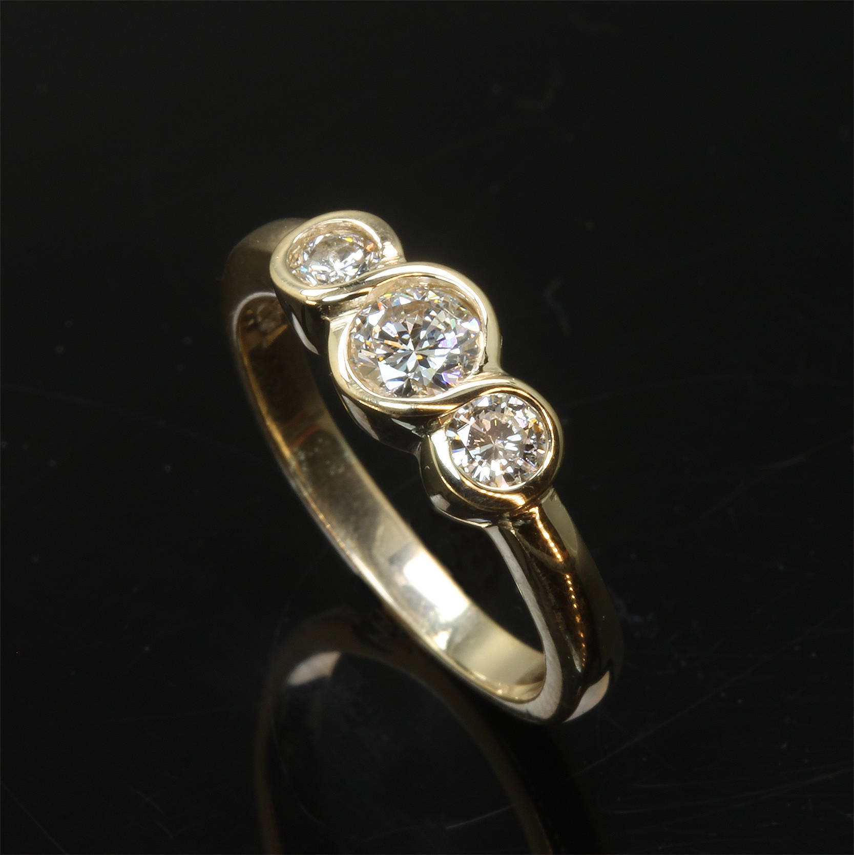 Handmade 14K yellow Gold Three Diamond Infinity Ring past