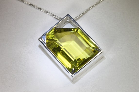 One of a kind! Handmade sterling silver pendant with 87 carat lemon quartz