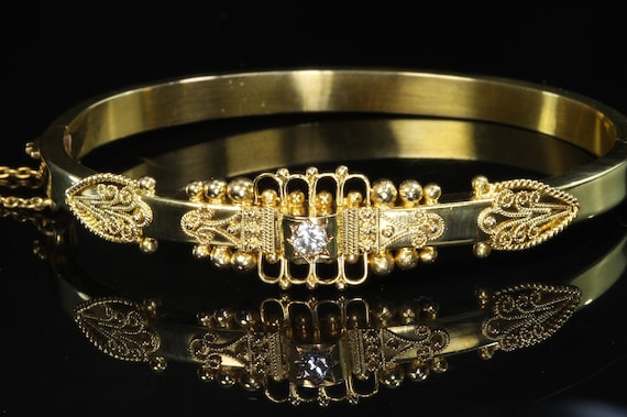 Vintage Castellani 15 karat yellow gold and solitaire diamond bangle bracelet