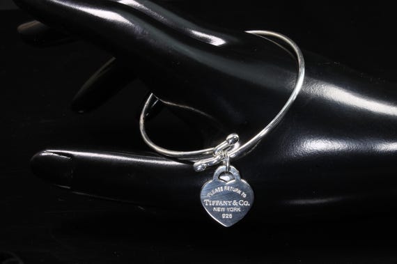 Vintage Tiffany and Co 925 wire bangle with: Please return to Tiffany & Co, New York, 925, heart shaped charm